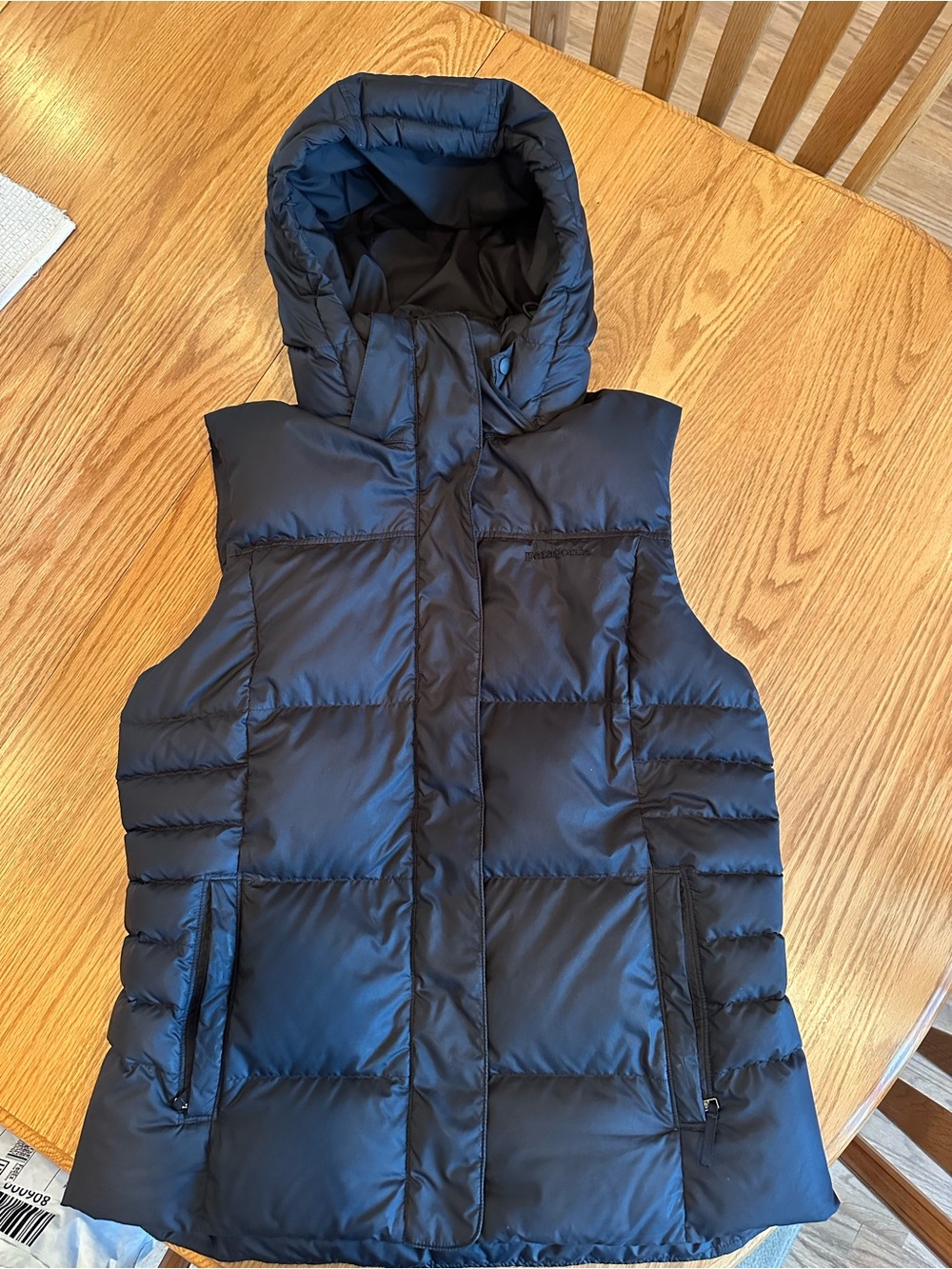 Patagonia women’s puffer hooded vest size L